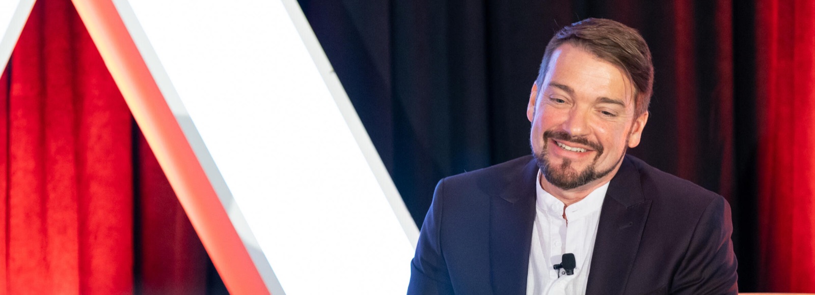 Chris Pirrotta speaking at an industry event